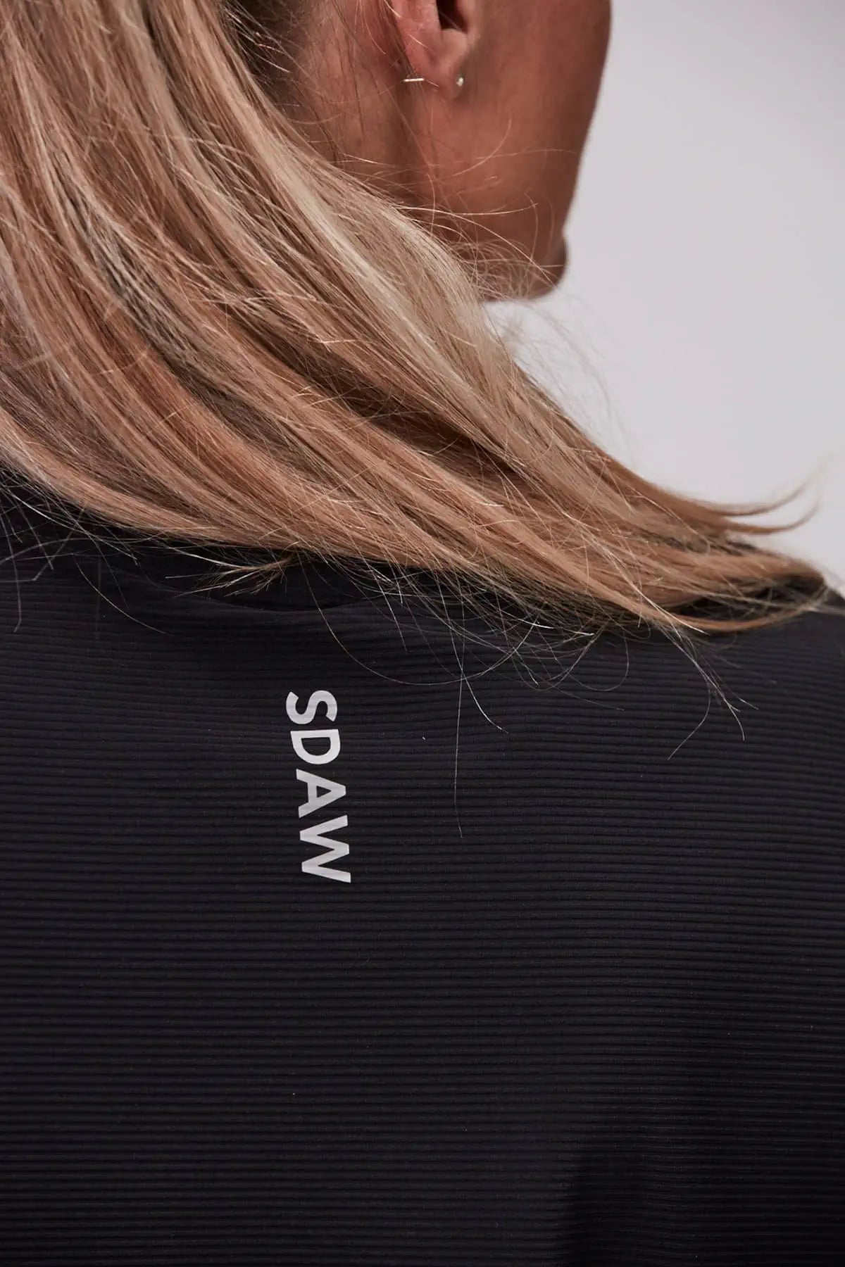 Loose fit padel top logoytp nacke